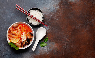Traditional Thai soup Tom Yum and rice bowl