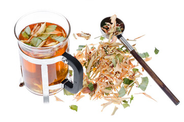 Glass with herbal tea from dried plants, alternative medicine