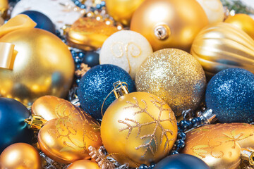 Christmas holidays composition with gold, blue balls.