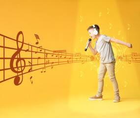 Cute little boy singing against color background