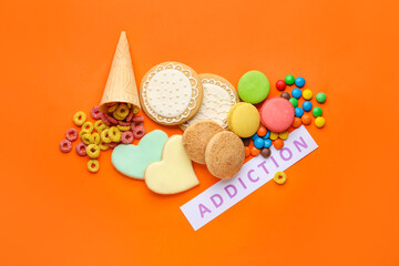 Different sweets on color background. Concept of addiction