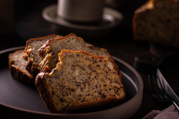 Slices of freshly baked banana bread on a ceramic plate