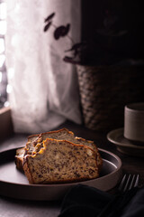 Slices of freshly baked banana bread on a ceramic plate