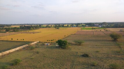 Sun setting on agri land