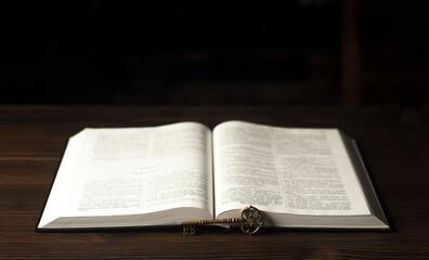 Open Bible. On the table. Holy Bible, Scripture.  Old antique key.