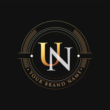 initial letter logo UN gold and white color, with stamp and circle object, Vector logo design template elements for your business or company identity.