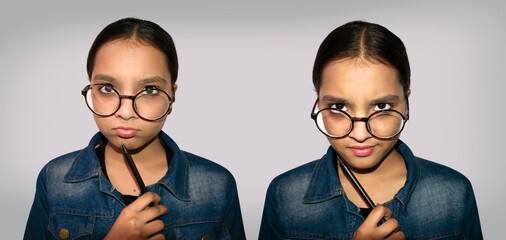 Indian Girl kid expression with spectacles on isolated background