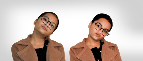 Indian Girl kid expression with spectacles on isolated background
