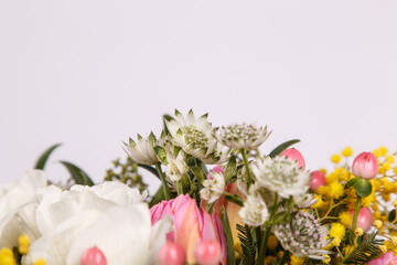 Spring flower arrangement with pink tulips 