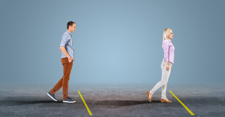 People walking next to SOCIAL DISTANCING phrase. Coronavirus COVID-19