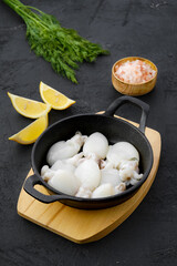 Baby cuttlefish in cast iron skillet