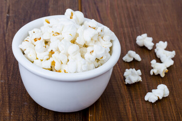 Sweet white airy crispy popcorn. Studio Photo