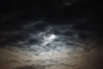 Fototapeta na wymiar Full Moon amidst Altocumulus Clouds 