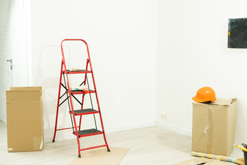 Stepladder standing in the room to renovate