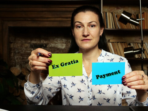 Business concept about Ex Gratia Payment with phrase on blank business cards.