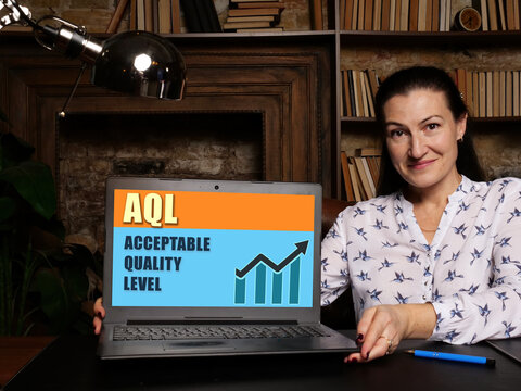  AQL ACCEPTABLE QUALITY LEVEL. Business and finance concept on device screen.