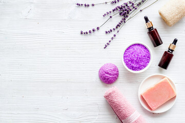 Fototapeta na wymiar Skin care beauty treatment - lavender bath salt and essential oil, top view