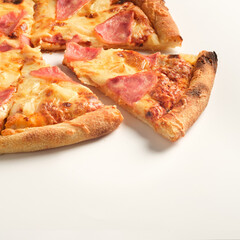 Pizza with ham and cheese isolated on white background. Italian food concept. Square. Appetizing pizza.