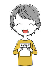 エンディングノートを持った笑顔のおばあちゃん