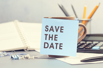 Save the date - concept of text on sticky note
