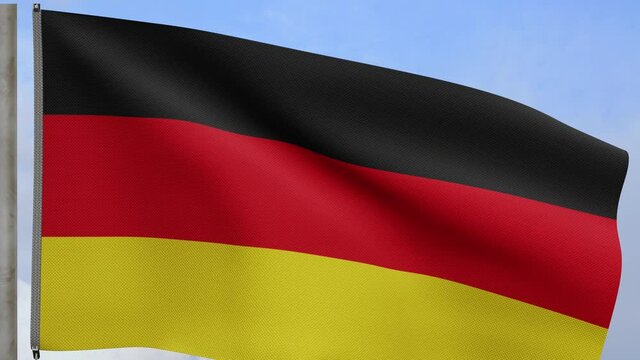 German flag waving in wind with blue sky. Close up of Germany banner blowing, soft and smooth silk. Cloth fabric texture ensign background. Use it for national day and country occasions concept.-Dan