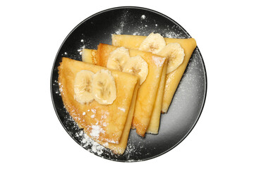 Plate of crepes with sugar powder and banana slices isolated on white background