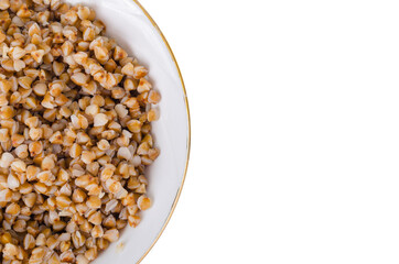 Boiled buckwheat, Russian porridge in white plate