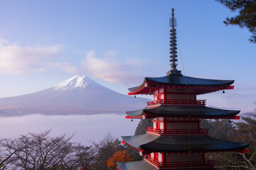 Rare scene of Chureito pagoda and Mount Fuji with morning fog, Japan in autumn