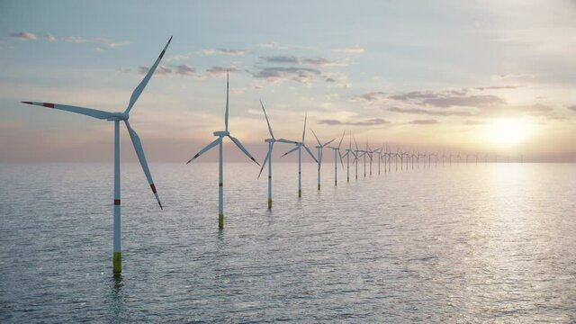 Aerial view of a long row of offshore wind turbines in the sea against low sun. Green and renewable energy concept. Realistic high quality 3d animation. 
