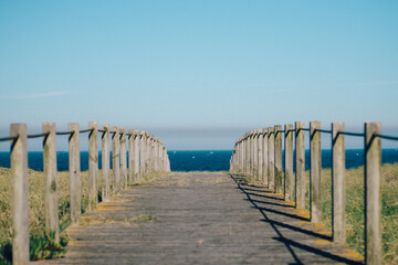 wooden path along sea in portugal