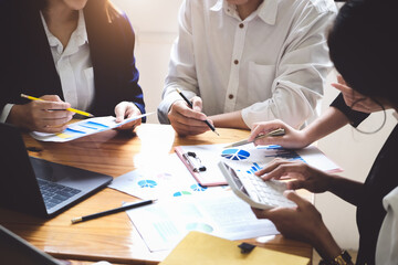 Start-up Business, a team of young entrepreneurs working together to increase profits into the company to increase business potential