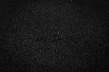 Obraz premium The dark black asphalt road.