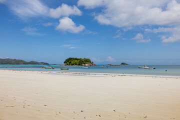 View of Chauve Souris Relais island from Cote D'or beach on Praslin Island, Seychelles