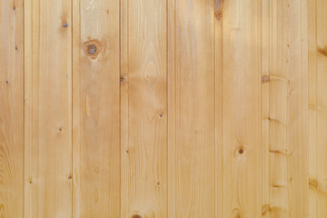 Fototapeta na wymiar background of pine bunks laid vertically