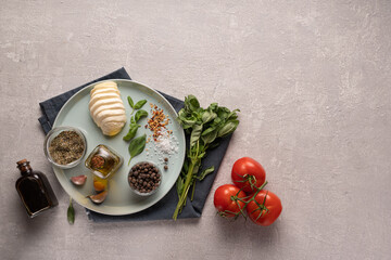 Ingredients for caprese salad close up on salad plate, top view