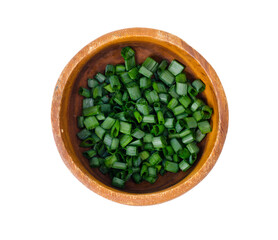 Bowl with slices of chopped green onions for preparing healthy dishes.