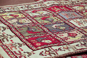  interesting background with handmade Turkish rugs in close-up