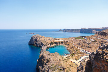 Fototapeta na wymiar Beautiful view of the bay and the sea from the ancient ruins of the city of Lindos on the island of Rhodes Greece.