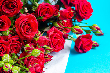 A bouquet of roses on a light background. Mother's Day, Women's Day, Valentine's Day or Birthday.