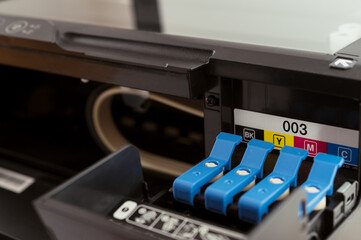 Replacement of cmyk set of ink cartridges in printer