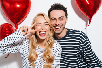 Happy attractive young couple celebrating Valentines Day