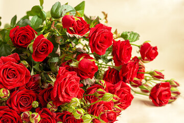 A bouquet of roses on a light background. Mother's Day, Women's Day, Valentine's Day or Birthday.