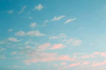 abstract blue sky with pink clouds