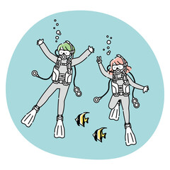 スキューバーダイビングを楽しむ男女
