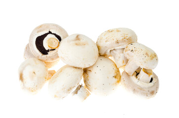 Bunch of fresh champignon mushrooms isolated on white background.