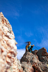 Woman taking a break during her hike in the wild