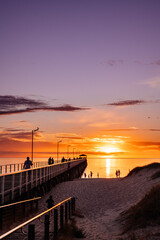 Fototapeta na wymiar Beautiful sunset by the jetty at Grange Beach, South Australia