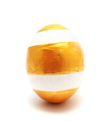 Golden perfect handmade painted easter egg isolated on a white background