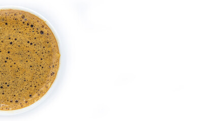 white cup with espresso coffee on a white background view from above copy space