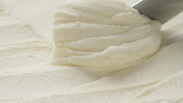 Cream cheese with knife, extreme close up of making sandwiches, 4k ProRes uncompressed